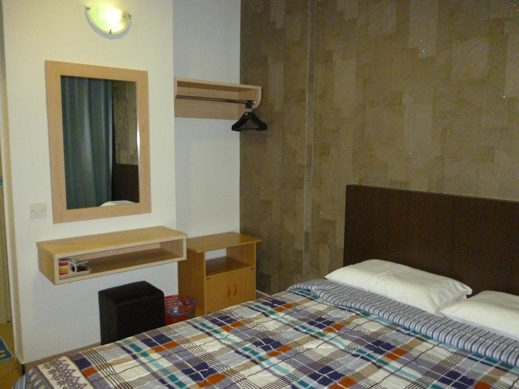 G Six Hotel Sitiawan Bilik gambar